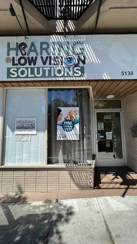 Hearing & Low Vision Solutions outside view of office building.
